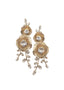 Double gold floral and crystal statement earring on white background