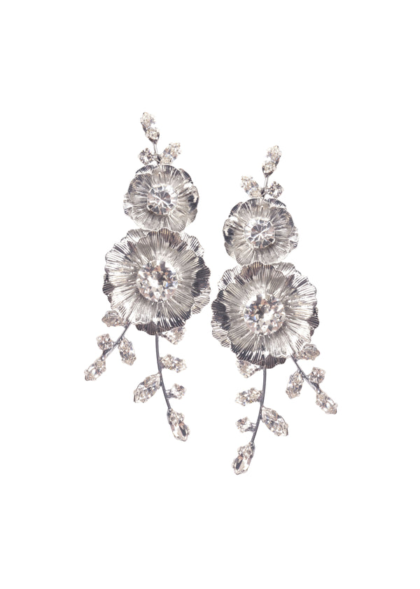 Double silver floral and crystal statement earring on white background