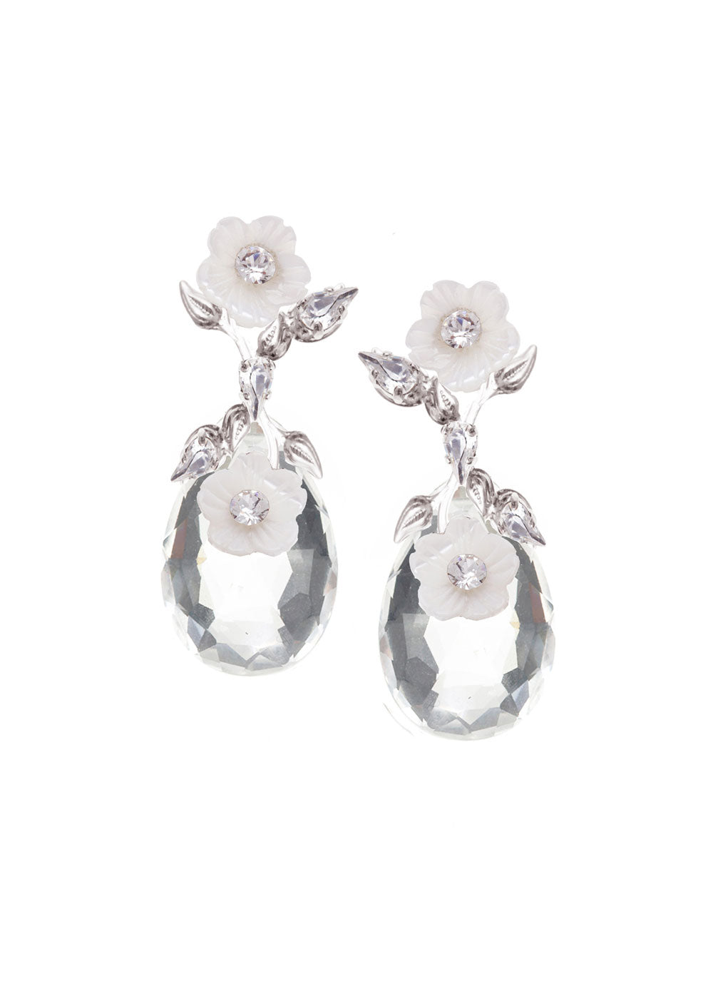 A pair of elegant glass tear drop earrings with hand carved mother of pearl flowers and crystal accents, in rhodium and matte gold plate finish.
