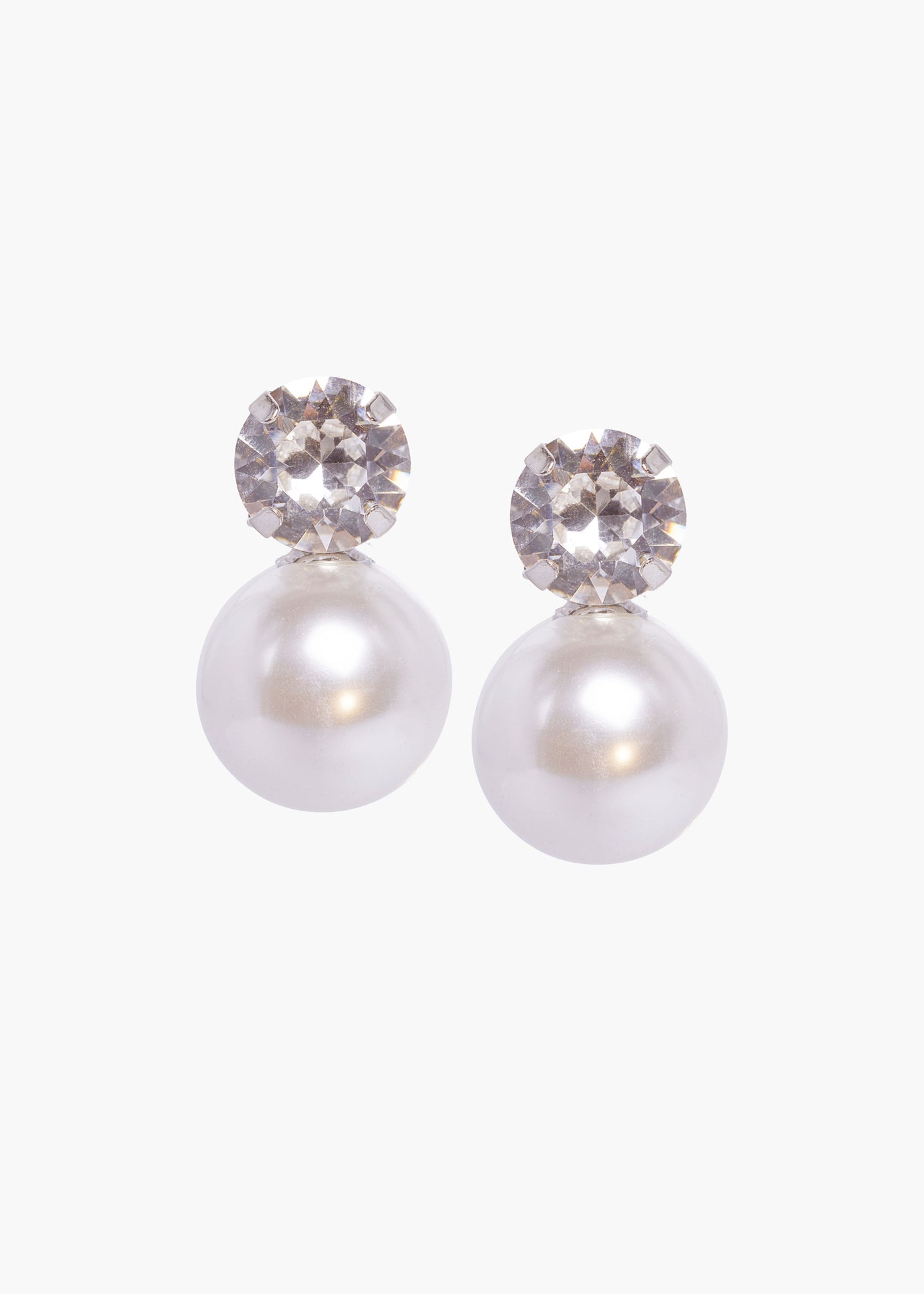 Pair of pearl earrings with crystal accents on a white background