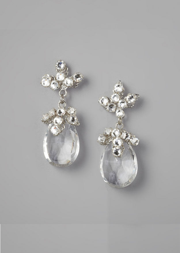 Crystal floral drop earring on grey background