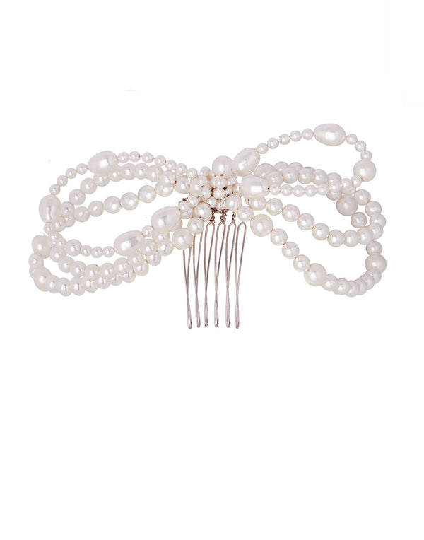 Swarovski Pearl bow hair comb on white background