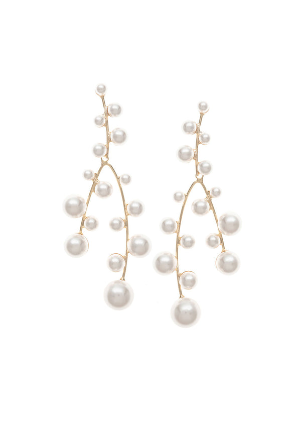 Cascading gold pearl bridal chandelier earring on white background