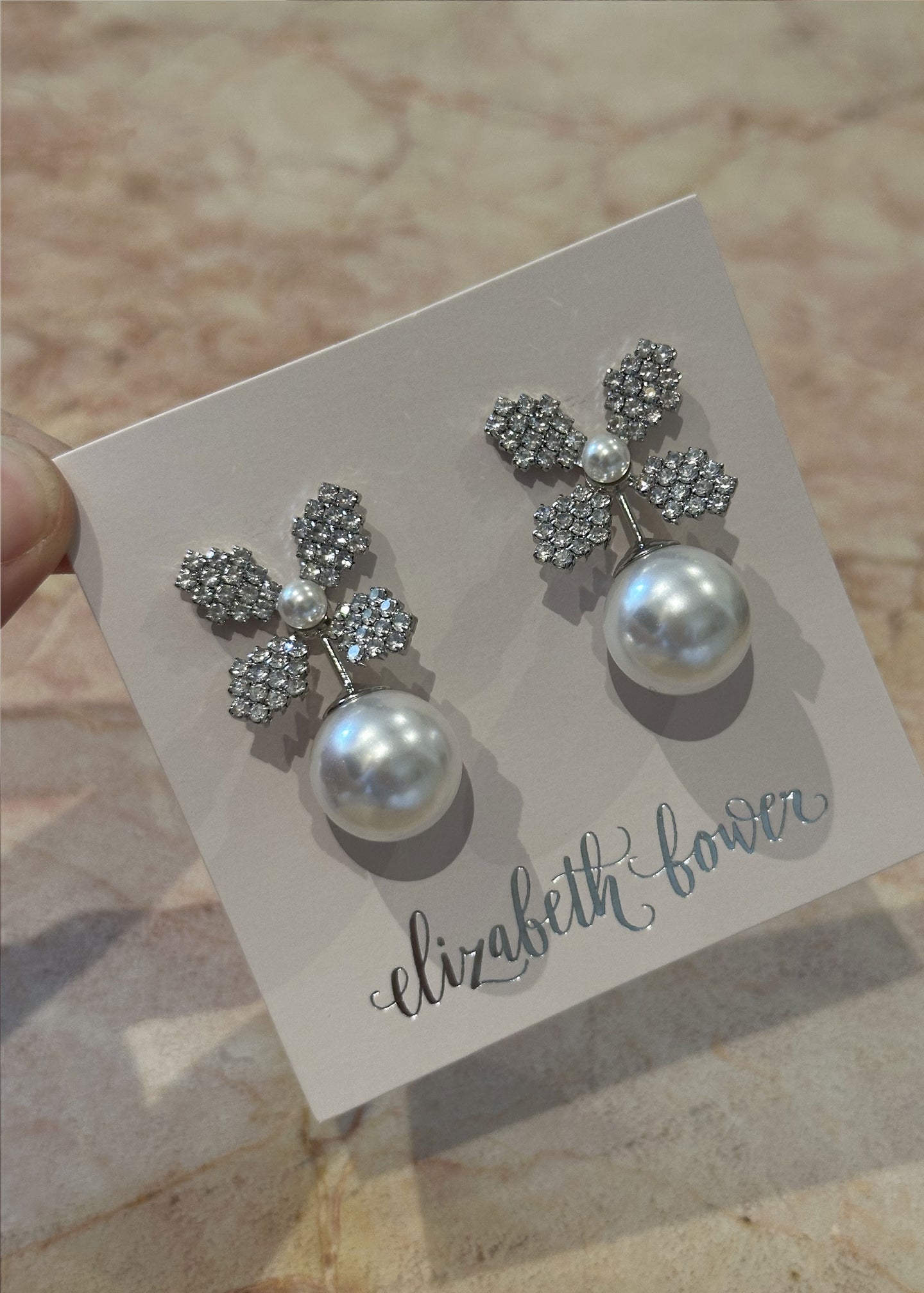 Swarovski crystal and pearl bridal stud earring on logo card