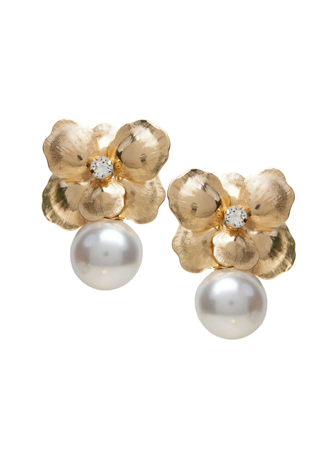 Gold metal flower and pearl stud earring on white background