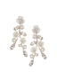 Mother of pearl and crystal mini statement stud earring in left right design in white background