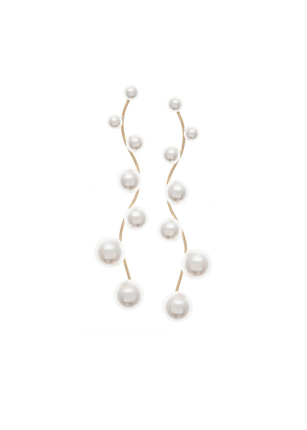 Long gold scattered gold pearl drop earring on white background