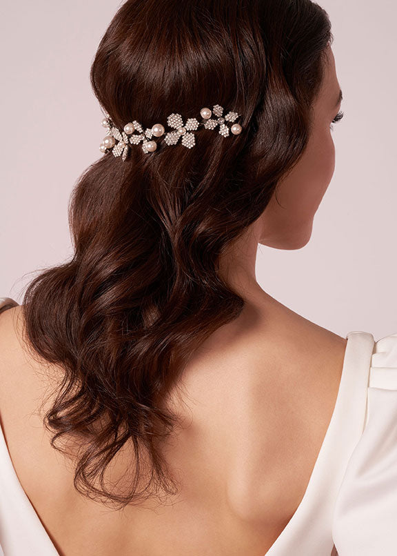 Floral Bridal hairpiece on in wedding dress  model (back view)