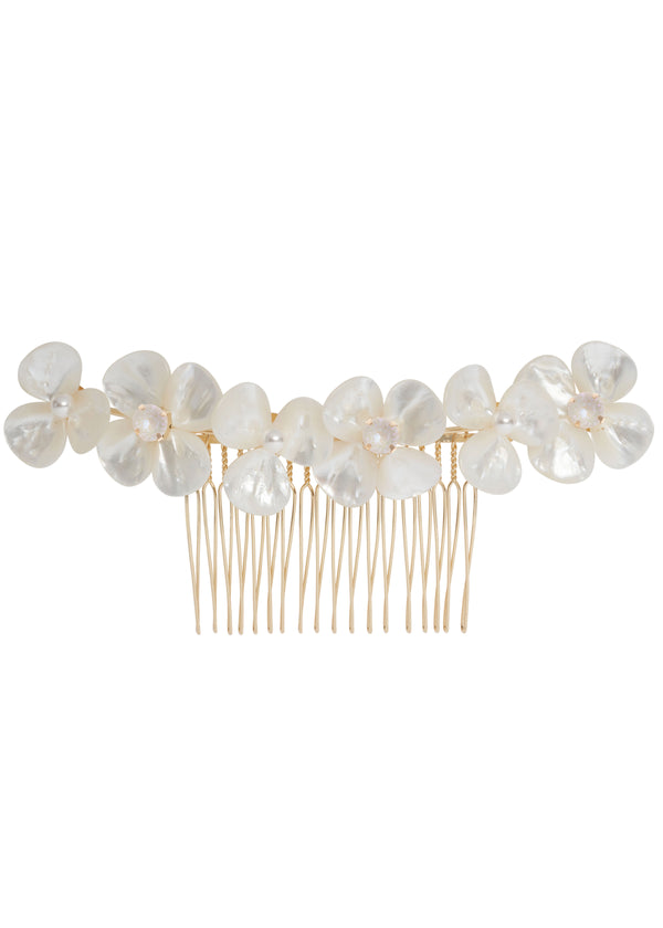 A gold floral wedding hair comb made from mother of pearl flowers and crystals