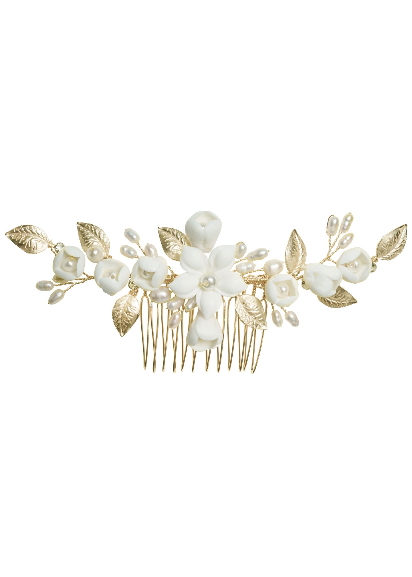 a gold hair comb featuring porcelain florals and pearl accents