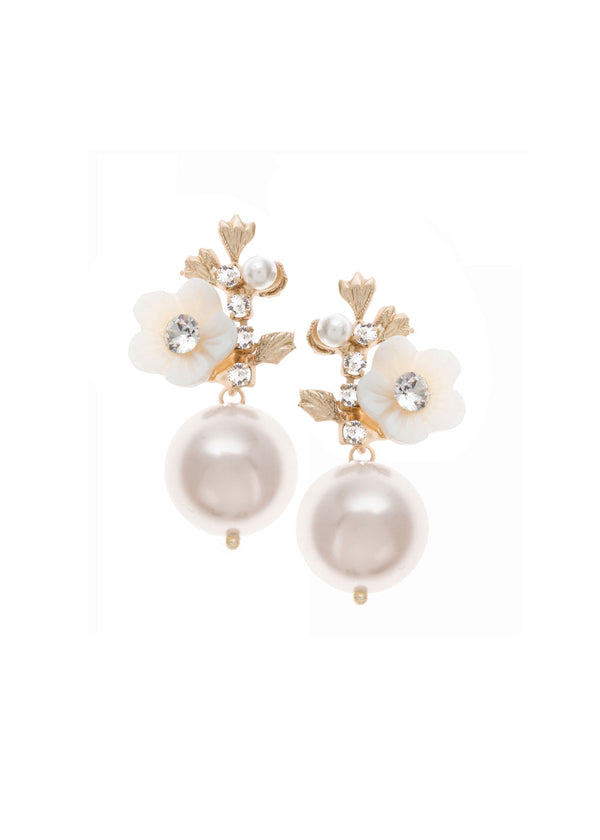 A pair of pearl earrings with mother of pearl floral accents in matte gold plating on a white background.