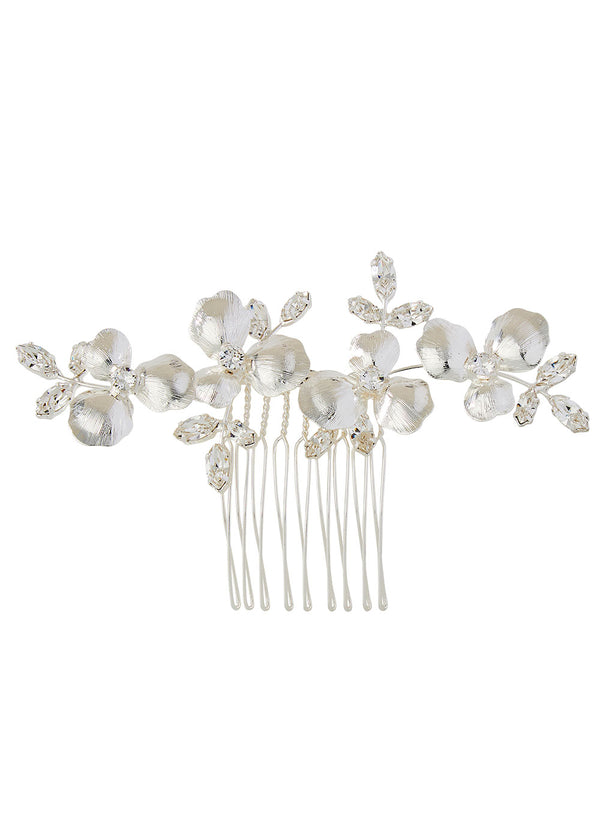 a floral silver hair comb on a white background