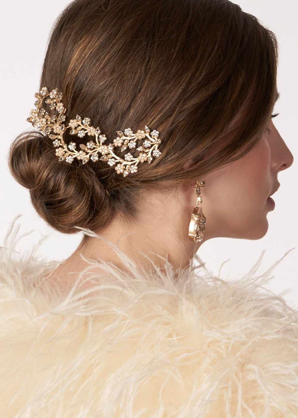 Floral bridal hairpiece on model side view