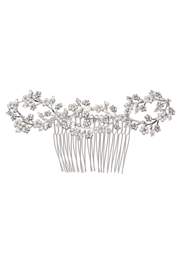 Pearl and crystal floral hair comb on white background