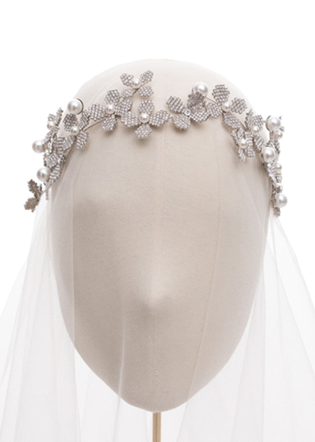 Floral Crystal hairpiece on headstand with tulle