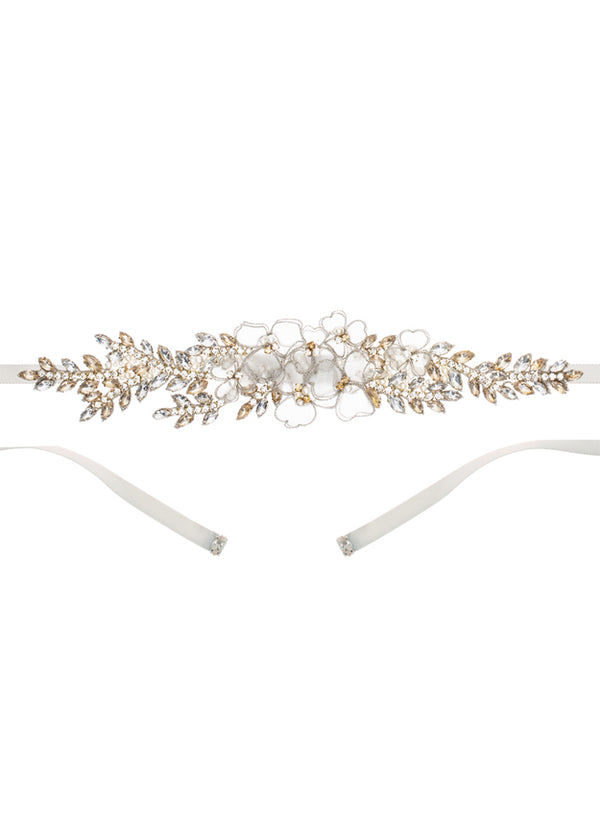 a floral wedding dress belt laid flat on white background