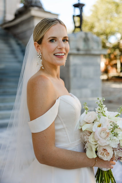 Cascading silver Swarovski floral chandelier on real bride