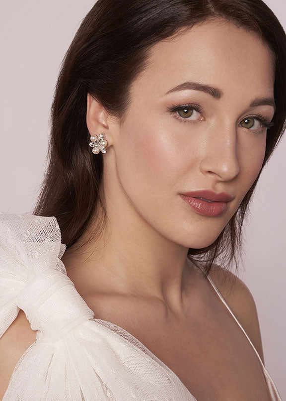 Swarovski pearl and crystal gold stud earring on model side view