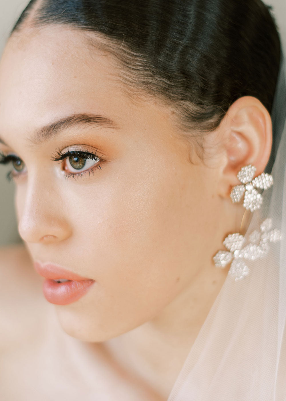 floral Swarovski crystal cascading earring in silver on model close  up