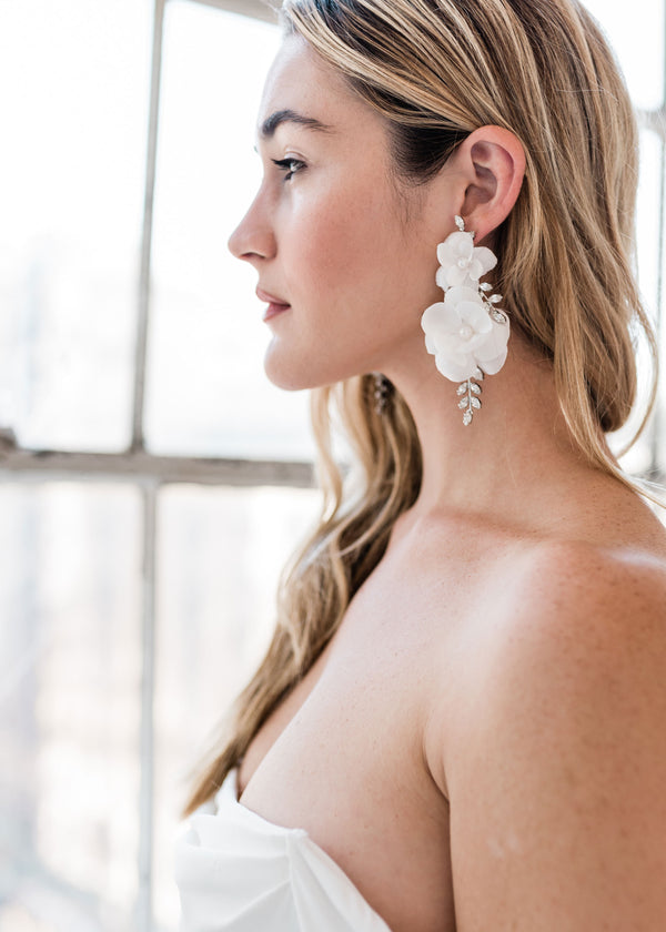 floral chandelier earrings with silk flowers on model side view