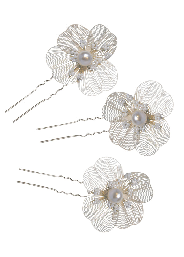 A set of 3 floral hairpins with pearl centers on a white background