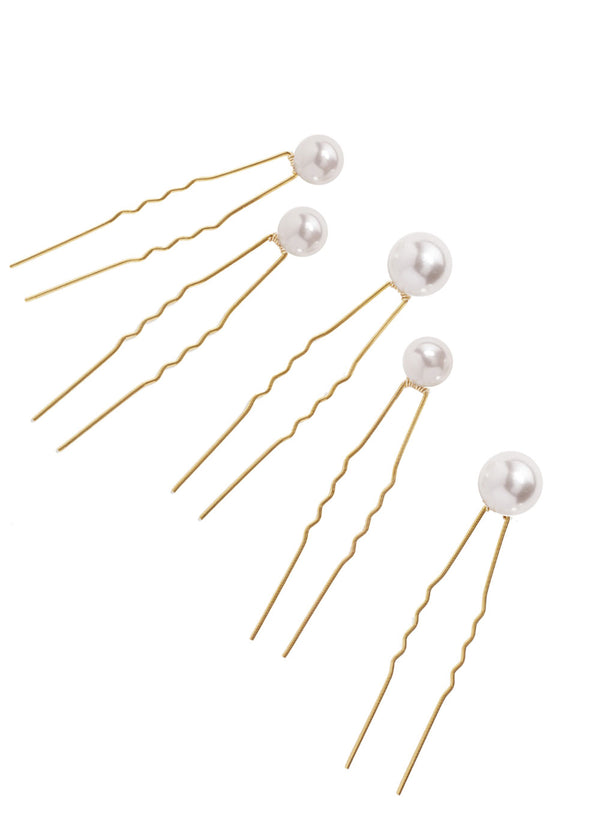 set of 5 mixed size gold pearl bridal hair pins on white background