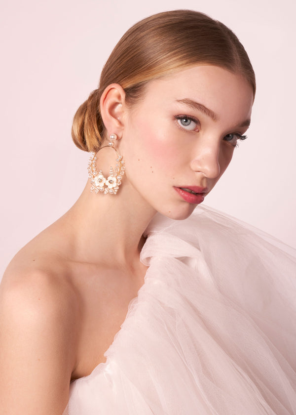 Gold Floral Hoop earring on model with one shoulder tulle dress (side view)