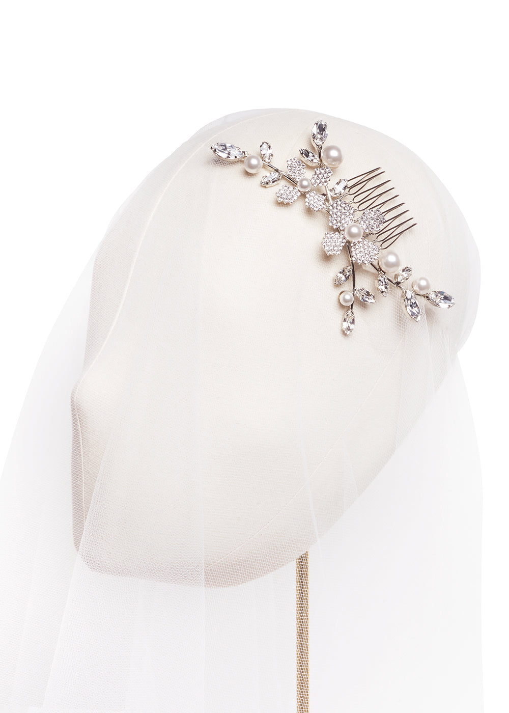 Gold Pearl and crystal floral hair comb on a headstand