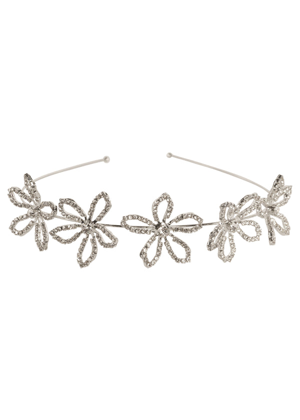 Scattered floral silver crystal hairpiece laid flat on white background