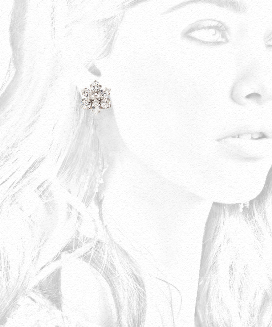A clustered Swarovski crystal silver stud earring on  sketch of model