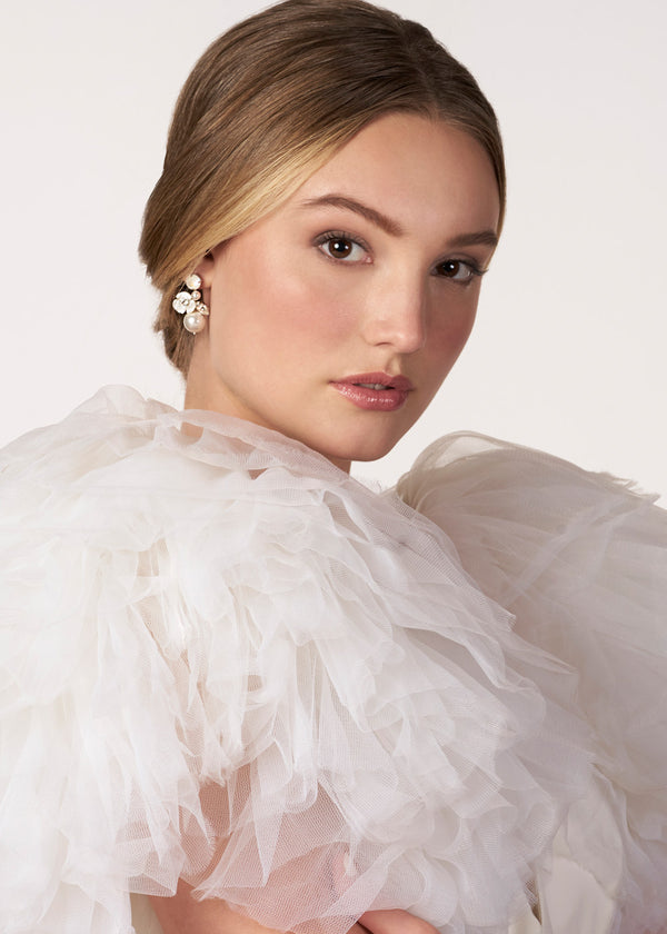 Pearl, crystal and mother of pearl silver bauble drop earring on model in tulle dress