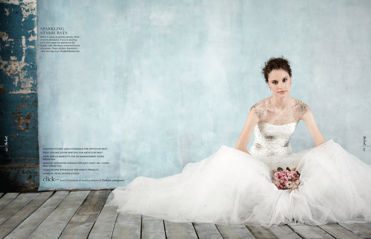 model in a tulle dress against a blue wall
