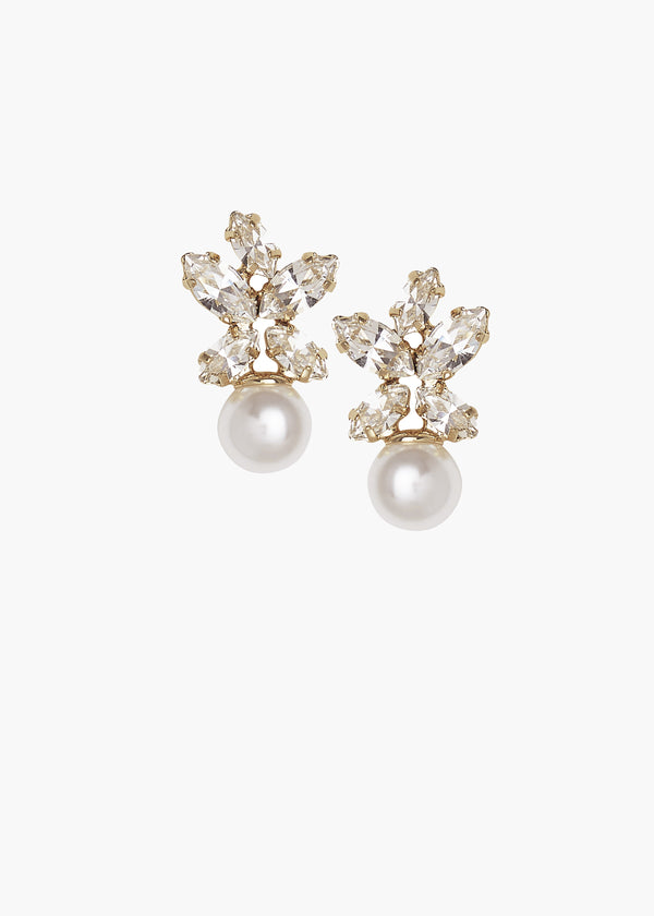 Pair of gold pearl stud earrings accented with Swarovski crystal embellishments on a white background