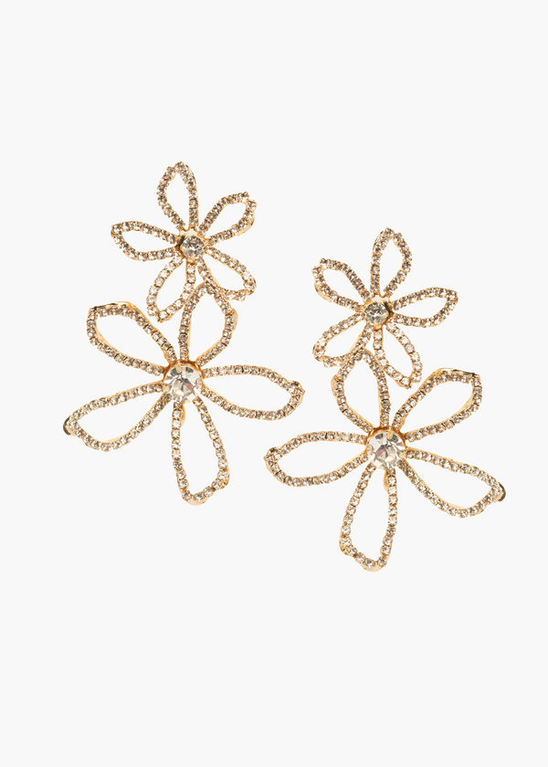 Gold floral earrings on a white background