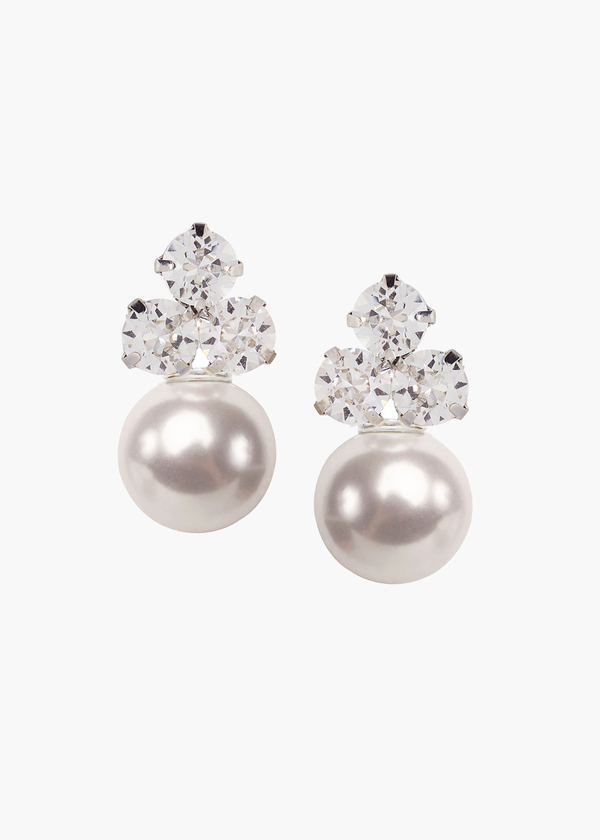 Pearl earrings with crystal accents on a white background