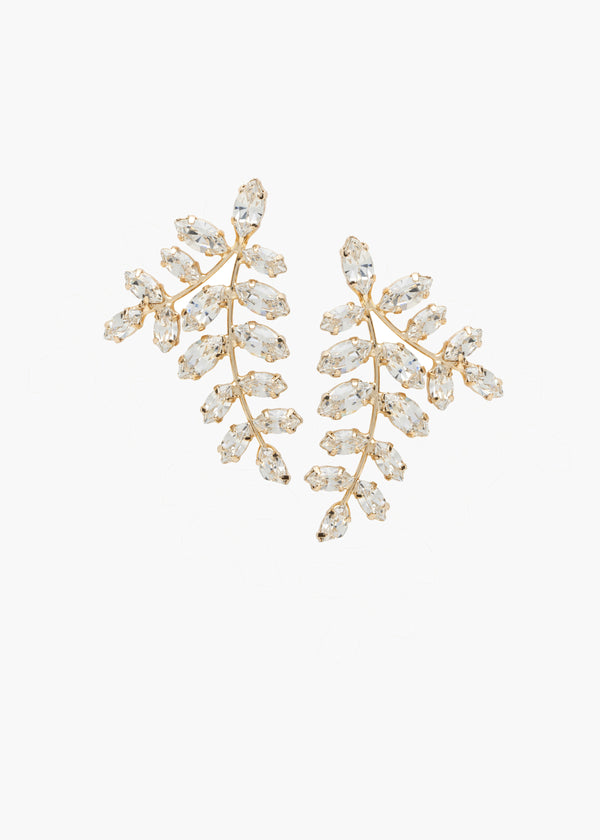 Pair of gold and crystal leaf-shaped earrings on a white background
