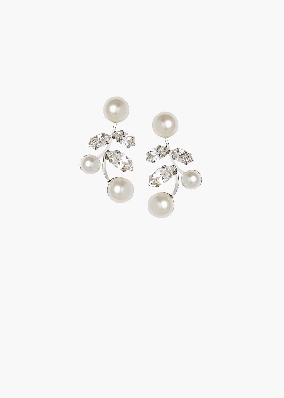 Pair of pearl and crystal earrings on a white background