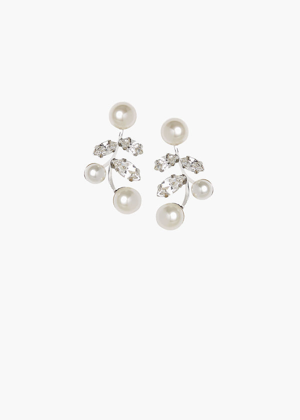 Pair of pearl and crystal earrings on a white background