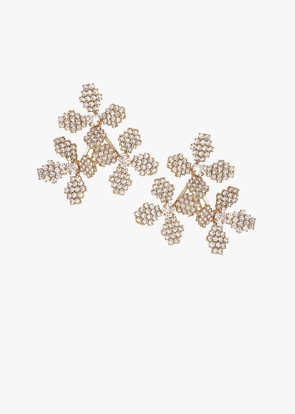 Gold floral earrings on a white background