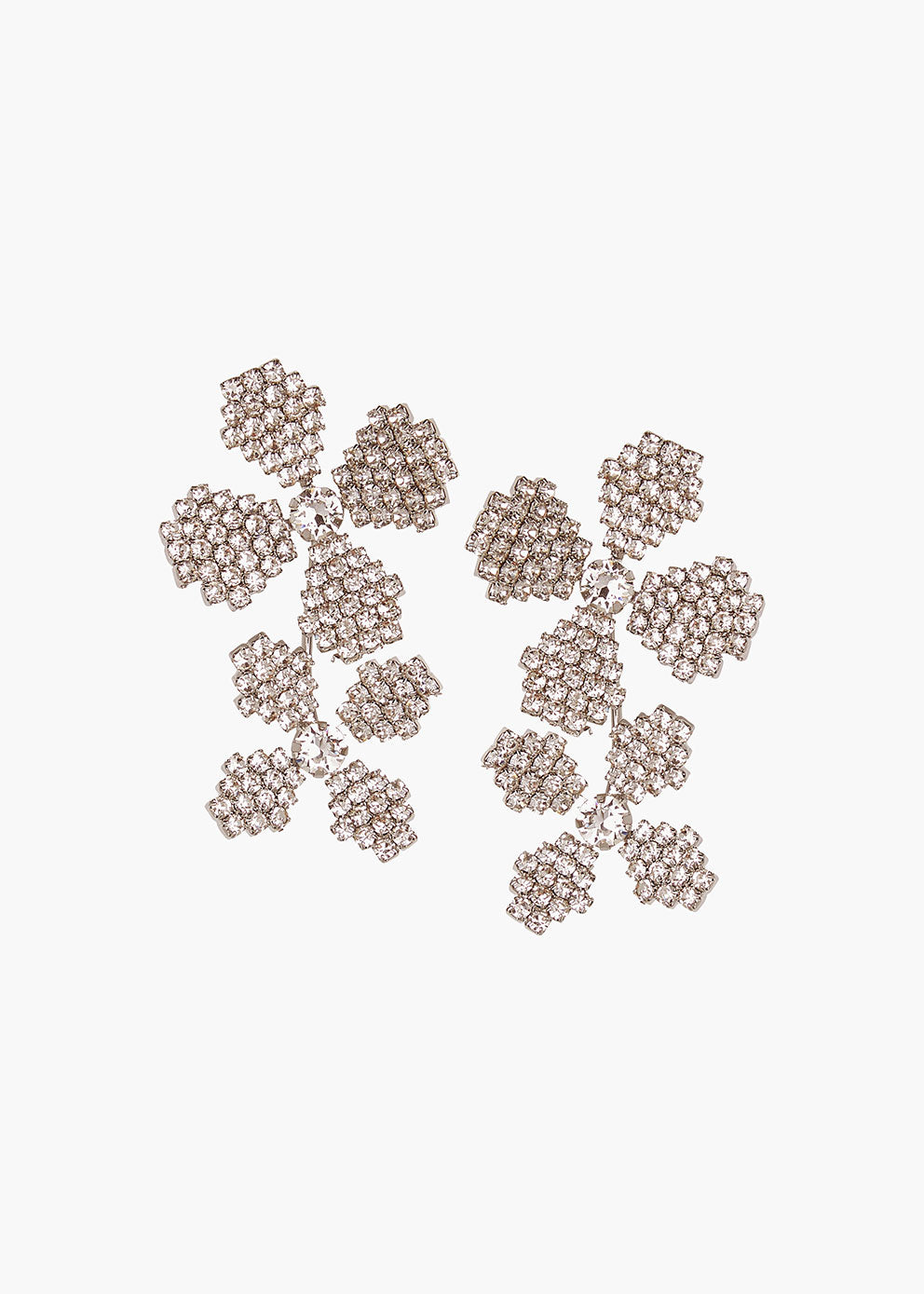 Decorative floral arrangement with metallic flowers on a white background