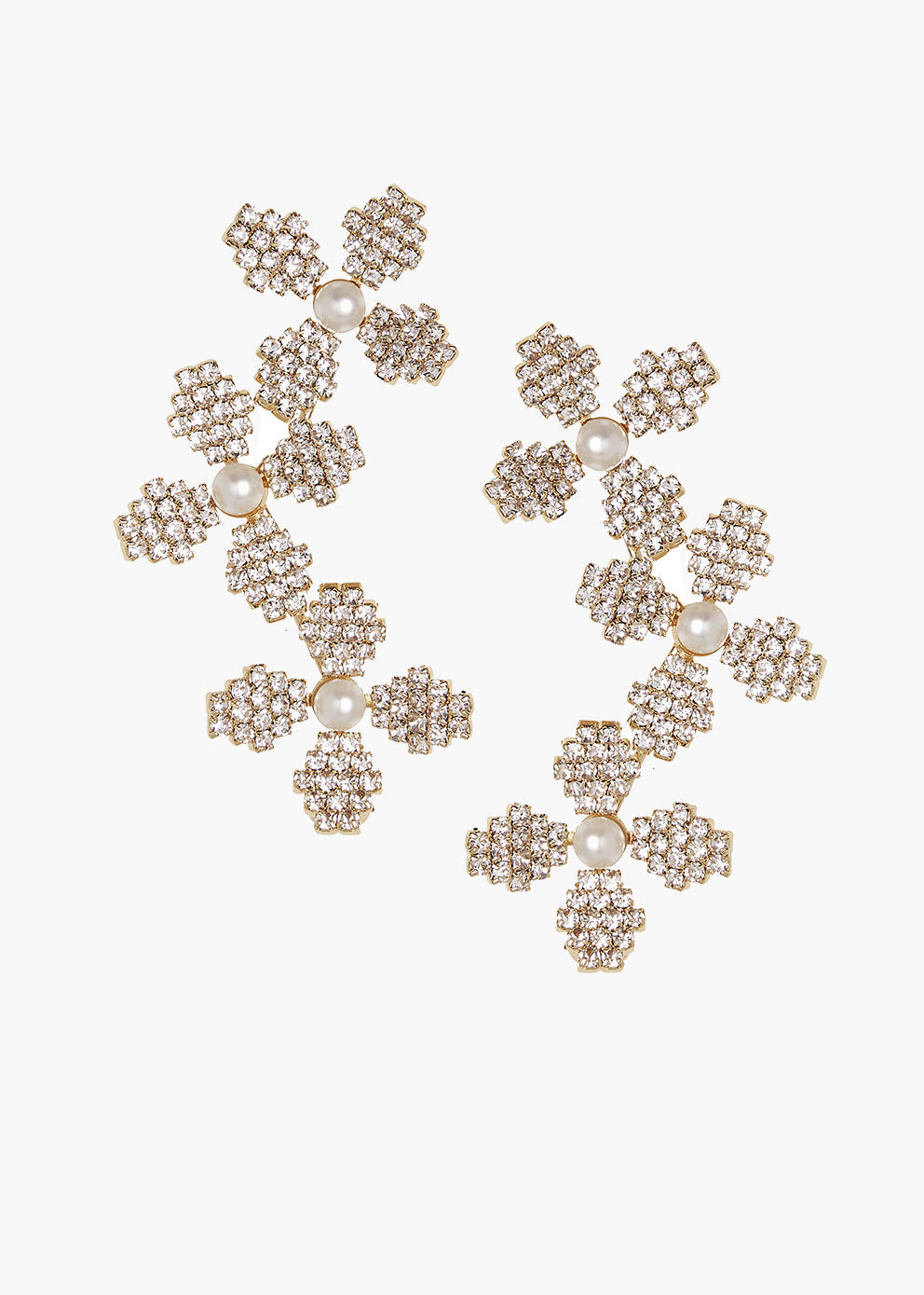 Pair of gold floral earrings with pearl accents on a white background