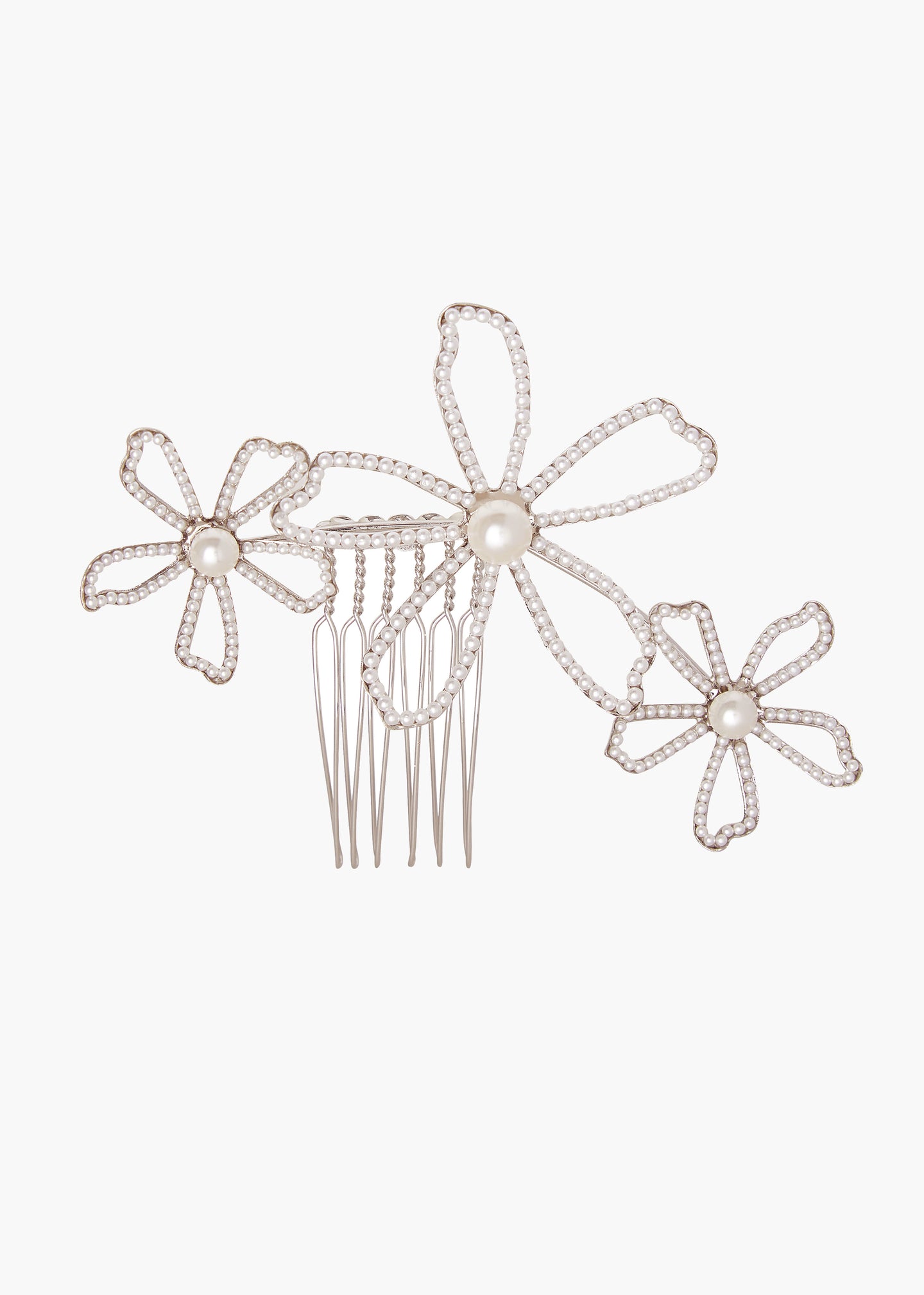 Decorative hair comb with floral designs on a white background