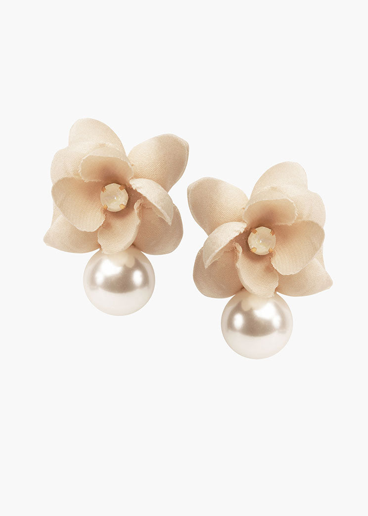 Pair of blush floral pearl earrings on a white background