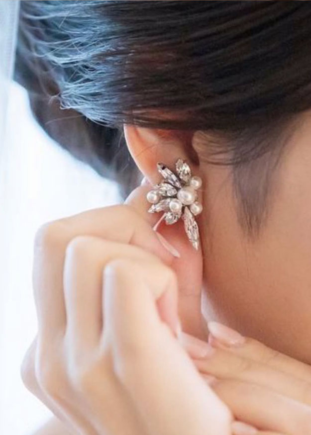 crystal earrings detail image on bride
