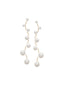 Long gold scattered pearl drop earring on white background