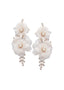 Blush silk floral statement earring with Swarovski crystals on white background 
