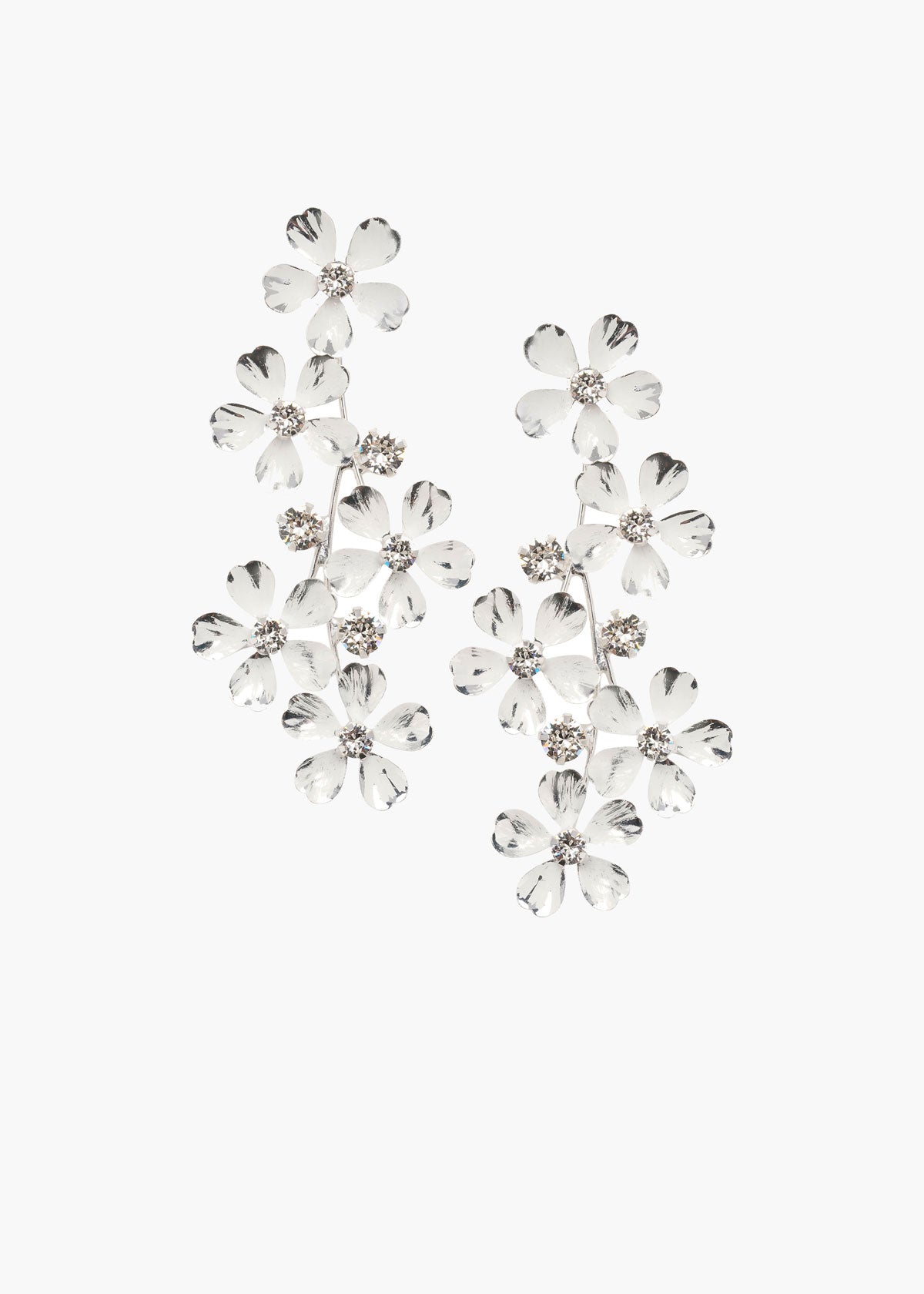 Floral earrings with clear stones on a white background
