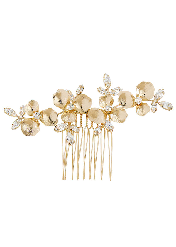 A golden hair comb with floral accents and sparkling crystals designed for bridal wear.