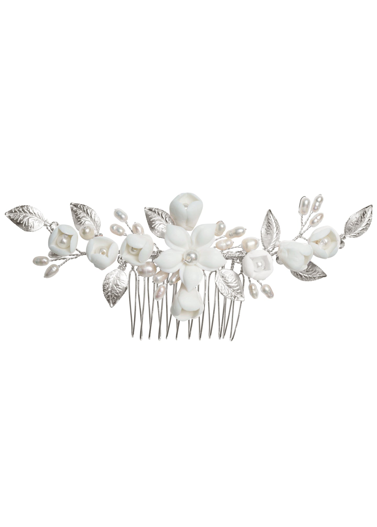 A hair comb featuring a floral design with hand wired leaves, porcelain flower, and accent crystals in a light rose gold plate finish.