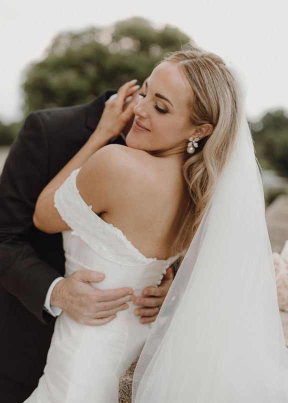 Bride wearing Pearl floral earring